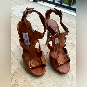 Jimmy Choo Sandals - Women’s size 6. Ankle strap,  brown leather and studded.